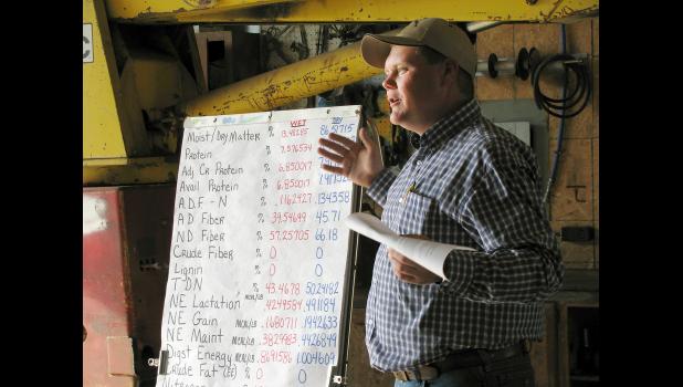 MU Extension livestock specialist Andrew McCorkill explains the importance of hay testing at a recent alfalfa tour in Ash Grove, Mo. Photo by Linda Geist