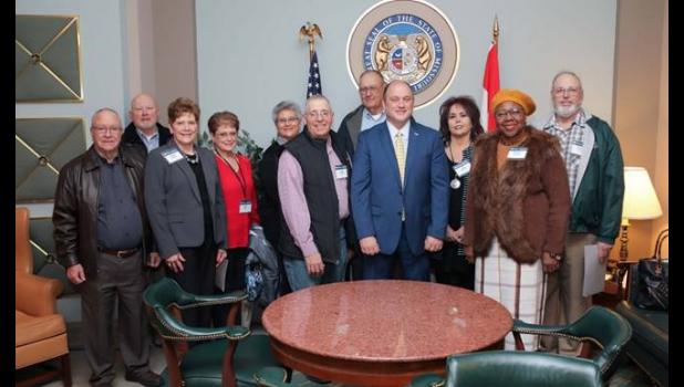 Senator Hoskins welcomed members of the Missouri Farm Bureau from the 21st District who were in the capital city for the annual Farm Bureau legislative banquet. Pictured in this photo are Mike and Jeanne Pollard, Caldwell County; Tom Silvey, Caldwell County; Barb Fifer, Ray County; Jim and Dona Proffitt, Ray County; Bill Robinson, Ray County; Violet Corbett, Johnson County; Mary Ellen Young, Johnson County; and William Gray, Lafayette County.