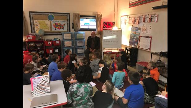 Pictured is Representative Jim Neely speaking to Mrs. Moran’s third grade class at Clinton R-III Elementary on how a bill becomes a law.