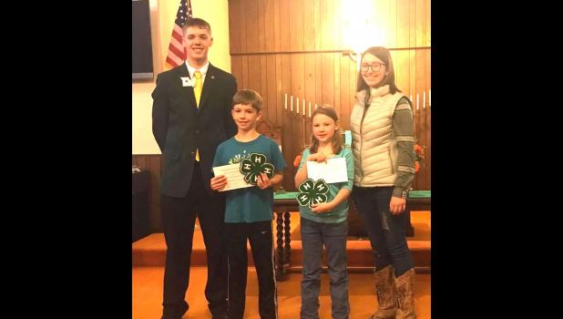 Rookie of the year winners: L to R: Kyle Hanson NW Regional Rep, Brodyn Baragary-Rookie Boy, Kathryn Farmer-Rookie Girl, Ryley Baragary, Caldwell County 4-H Council President