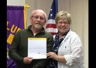 Dennis Cox and Red Esry receive certificates